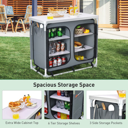 Professional title: ```Gray Portable Camping Kitchen Table with Integrated Storage Shelves```