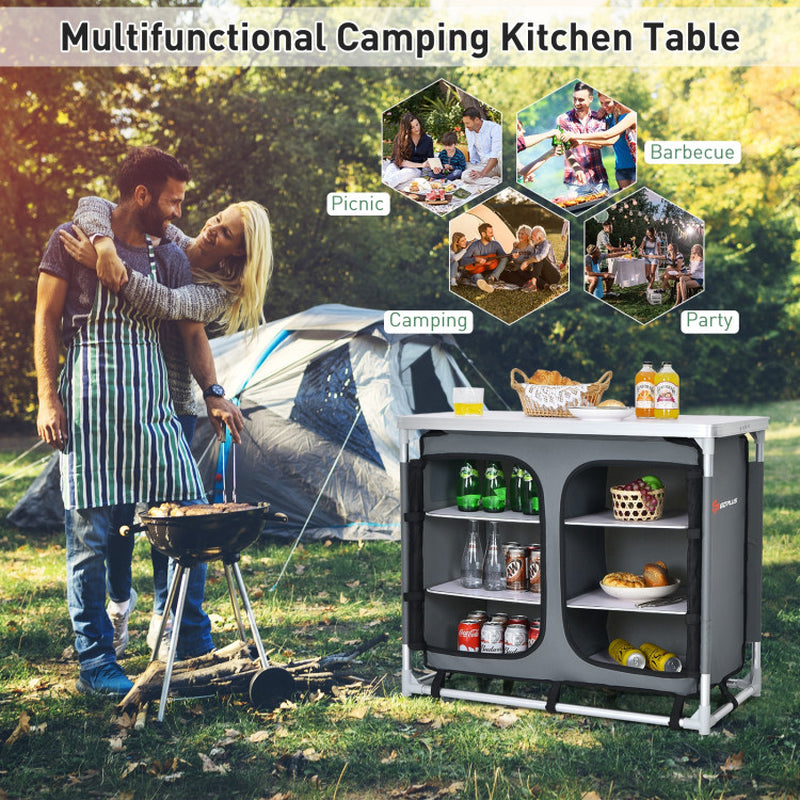 Professional title: ```Gray Portable Camping Kitchen Table with Integrated Storage Shelves```